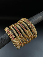 Gold style bangles set