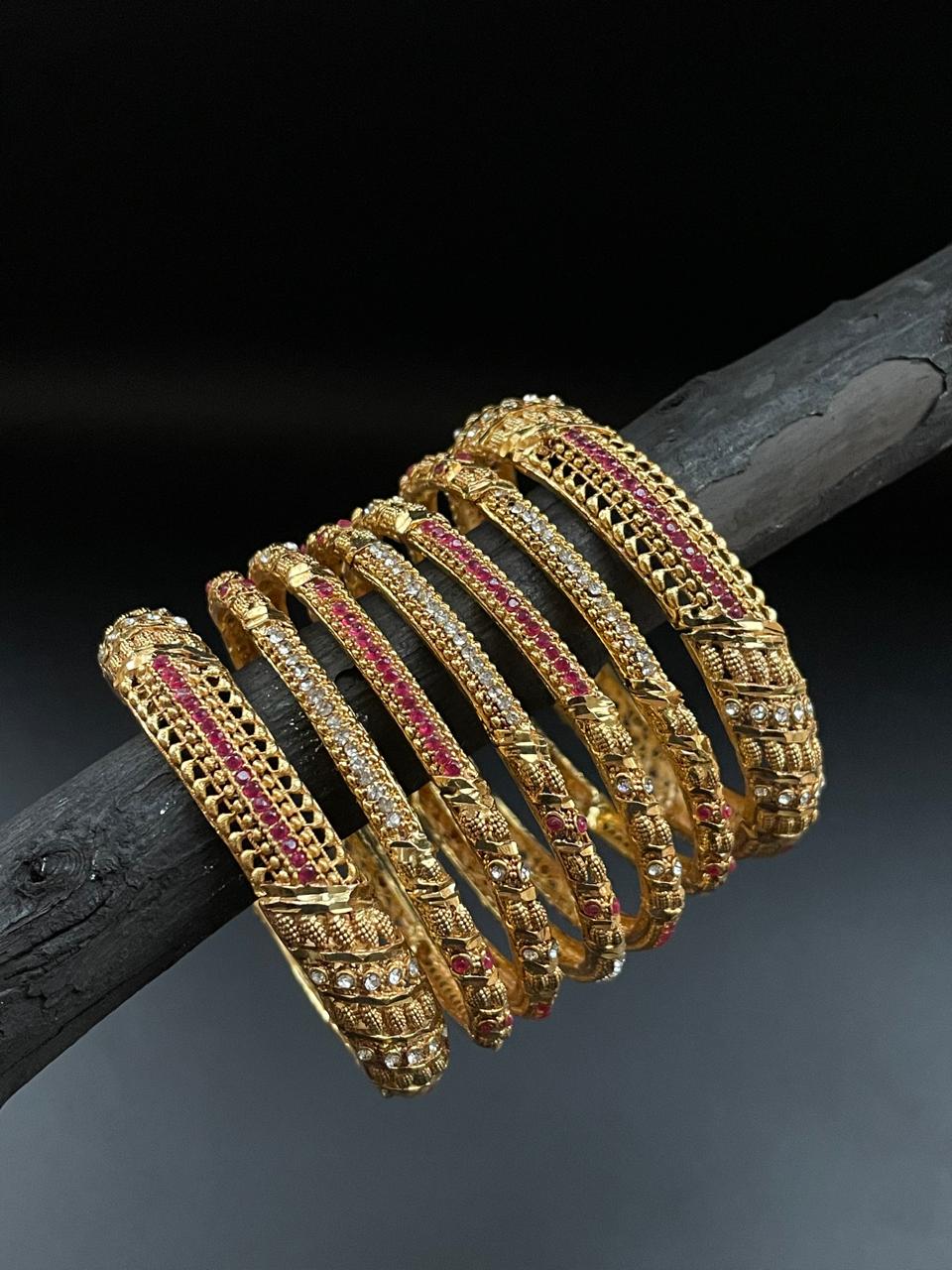 Gold style bangles set