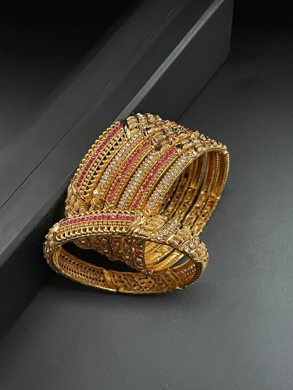 Gold style bangles set