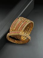 Gold style bangles set