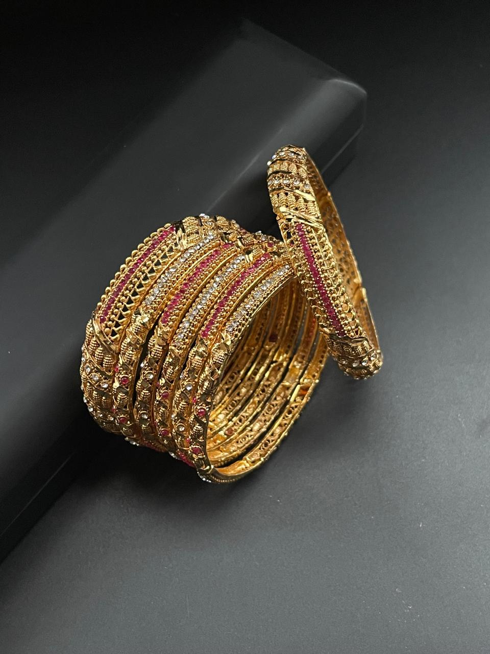 Gold style bangles set